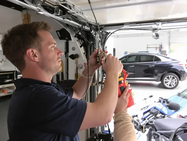 Yorba Linda Garage Door Repair safety certified technician performing cable replacement in Yorba Linda