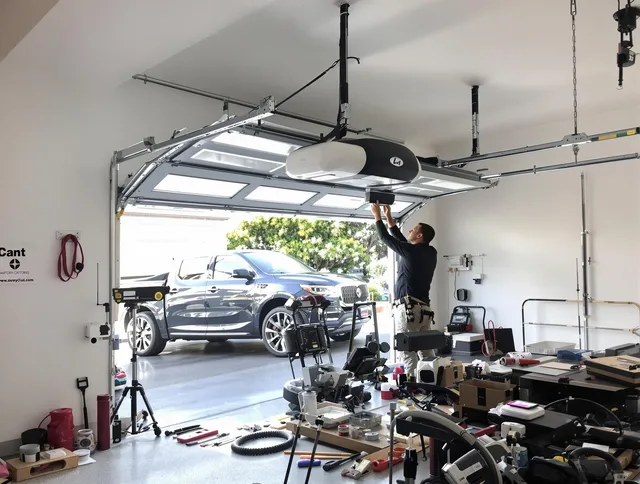 Yorba Linda Garage Door Repair specialist installing smart garage door opener system in Yorba Linda home