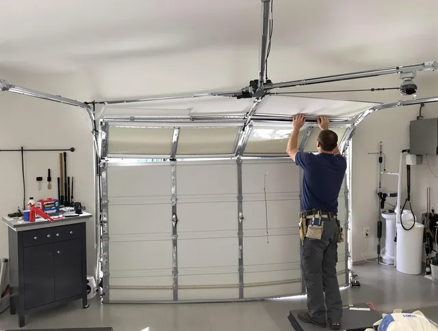 Yorba Linda Garage Door Repair specialist performing precise section replacement on Yorba Linda garage door